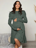 Robe-pull asymétrique de maternité à manches gigot