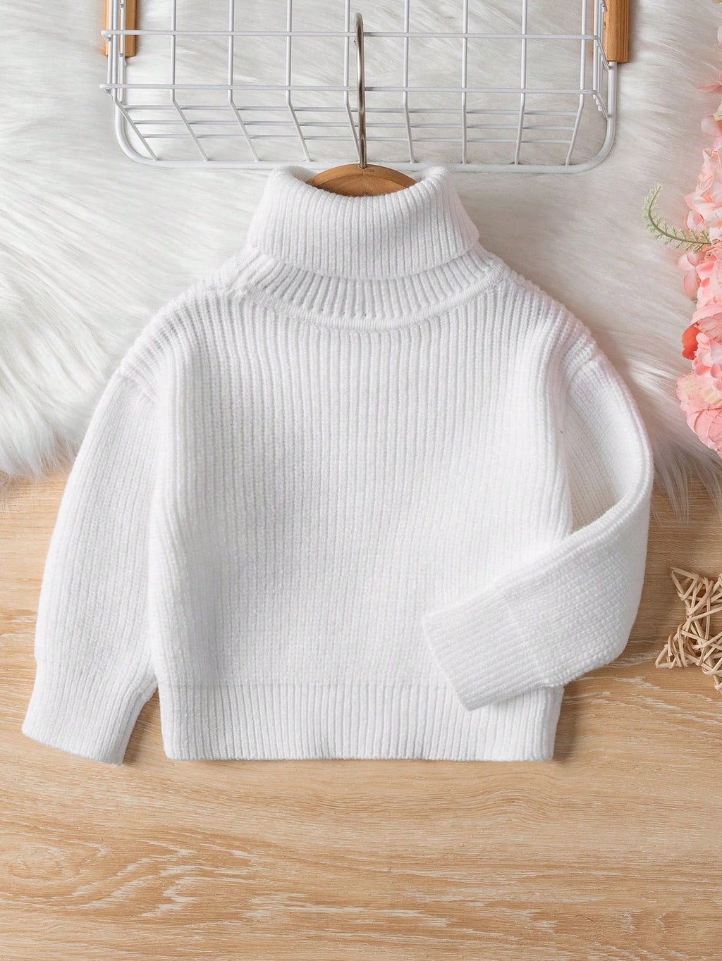 Chandail tricoté à col roulé de couleur unie pour bébés filles