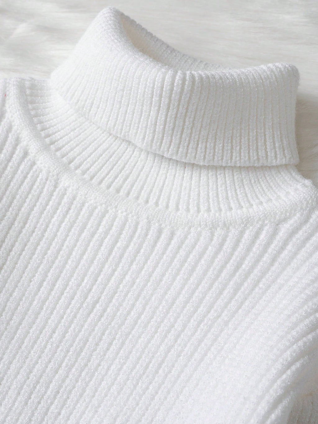 Chandail tricoté à col roulé de couleur unie pour bébés filles