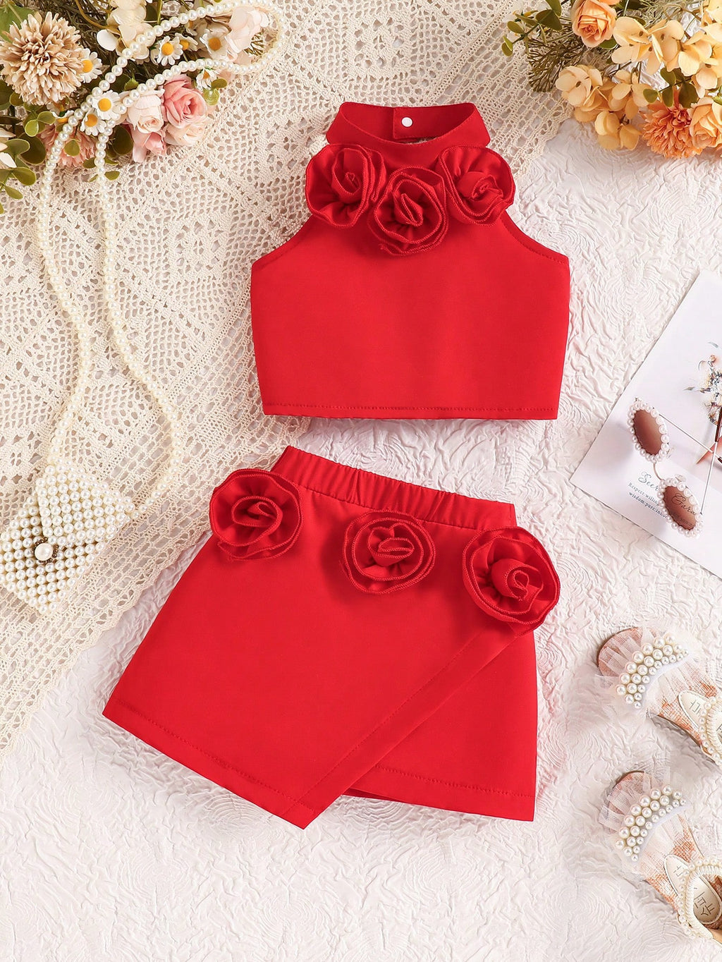 Ensemble 2 pièces bébé fille t-shirt sans manches fleuri boutonné et jupe rouge