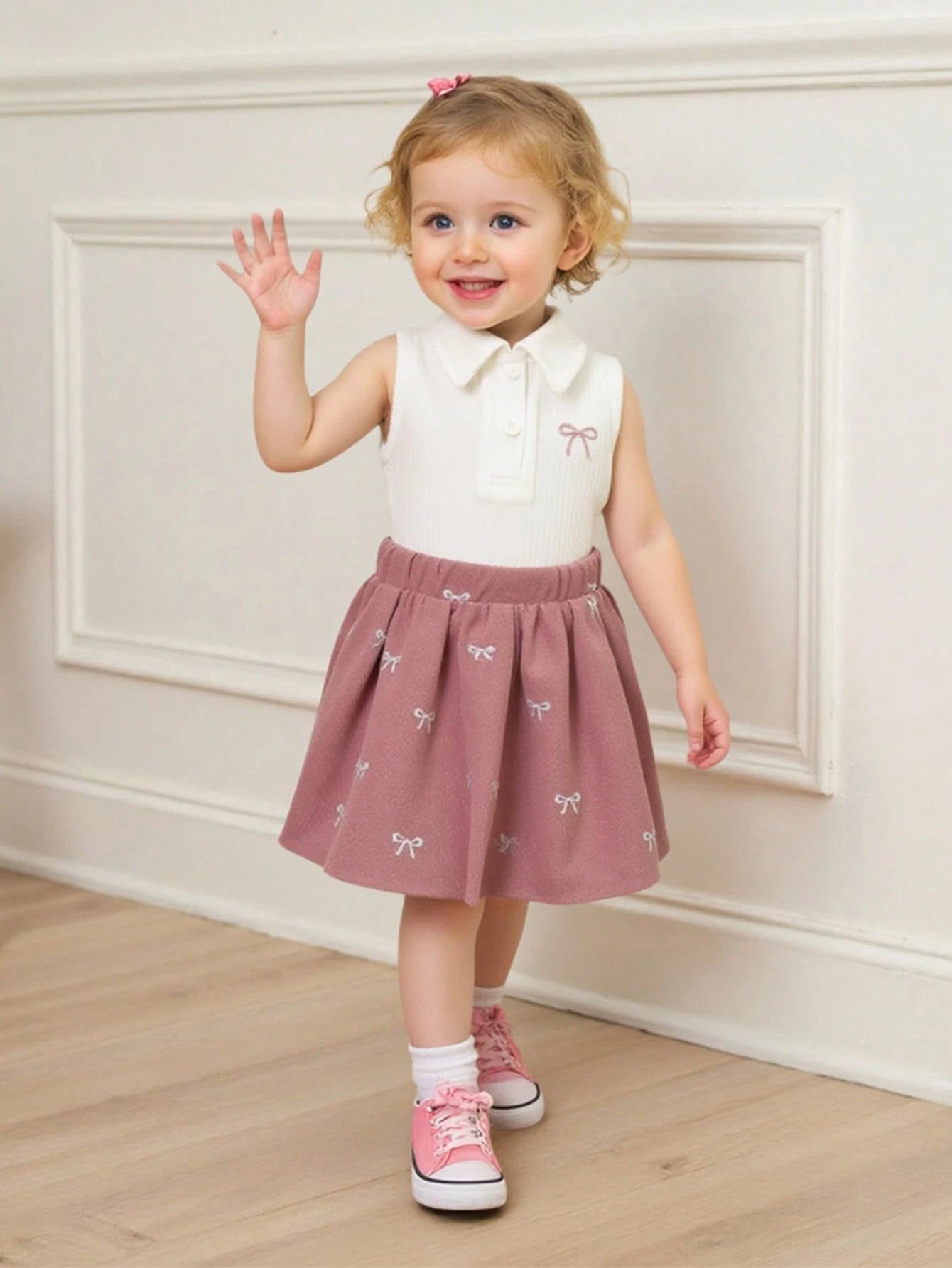Ensemble 2 pièces Souflis pour bébé fille : haut brodé rose et jupe plissée