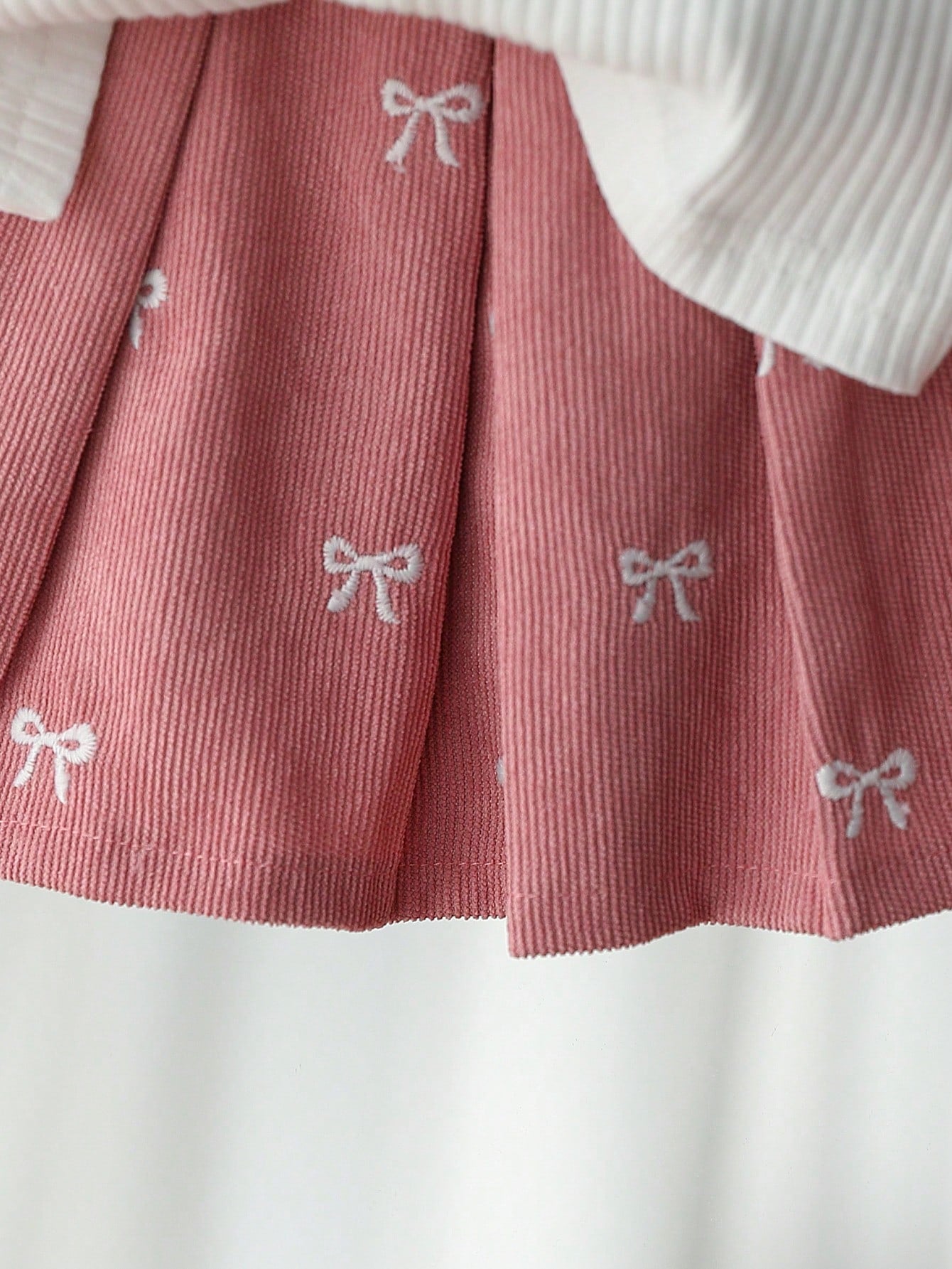 Ensemble 2 pièces Souflis pour bébé fille : haut brodé rose et jupe plissée