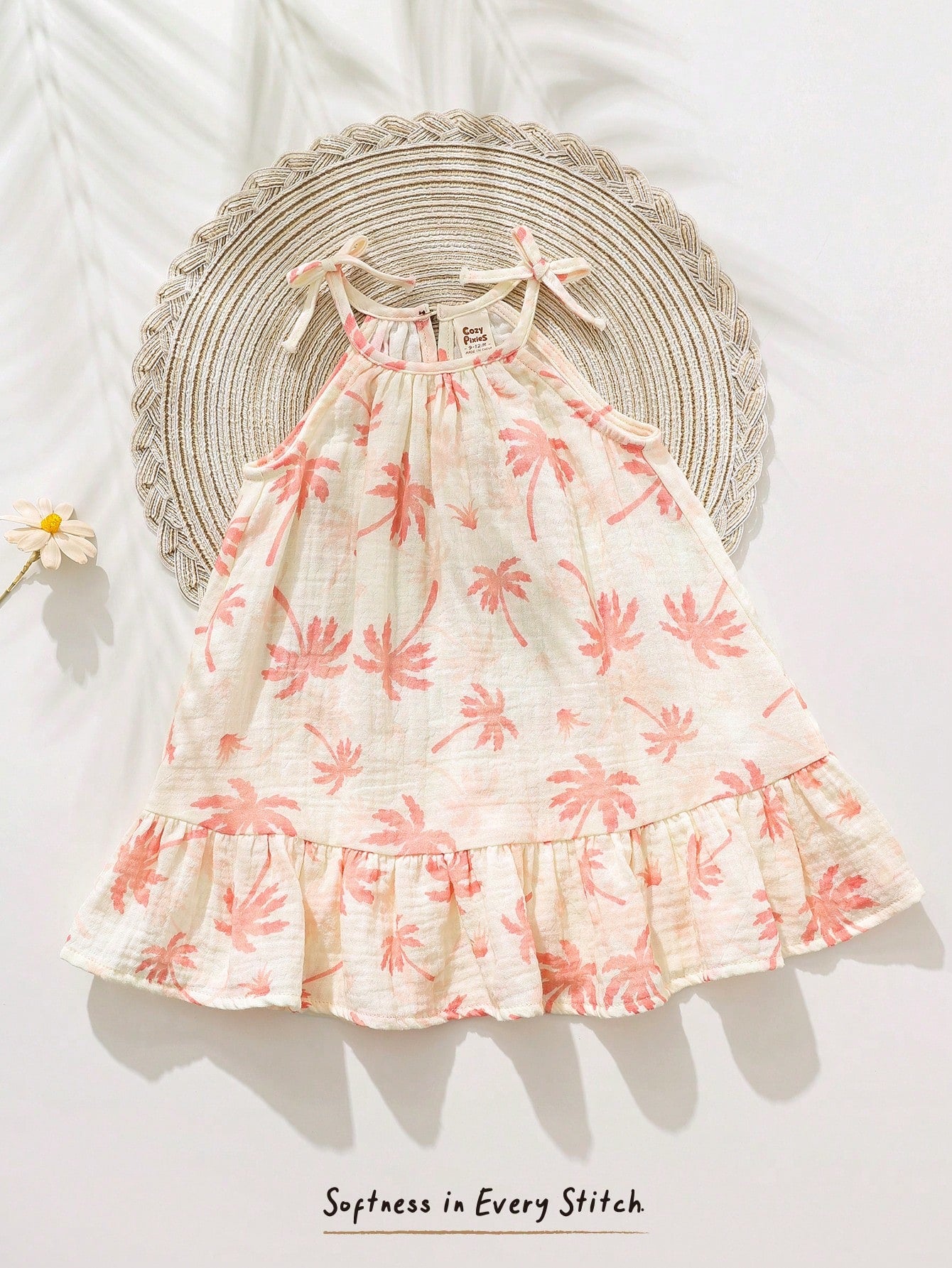 Robe d'été décontractée sans manches Bambinoo x Cozy Pixies pour bébé fille avec imprimé floral et plantes tropicales