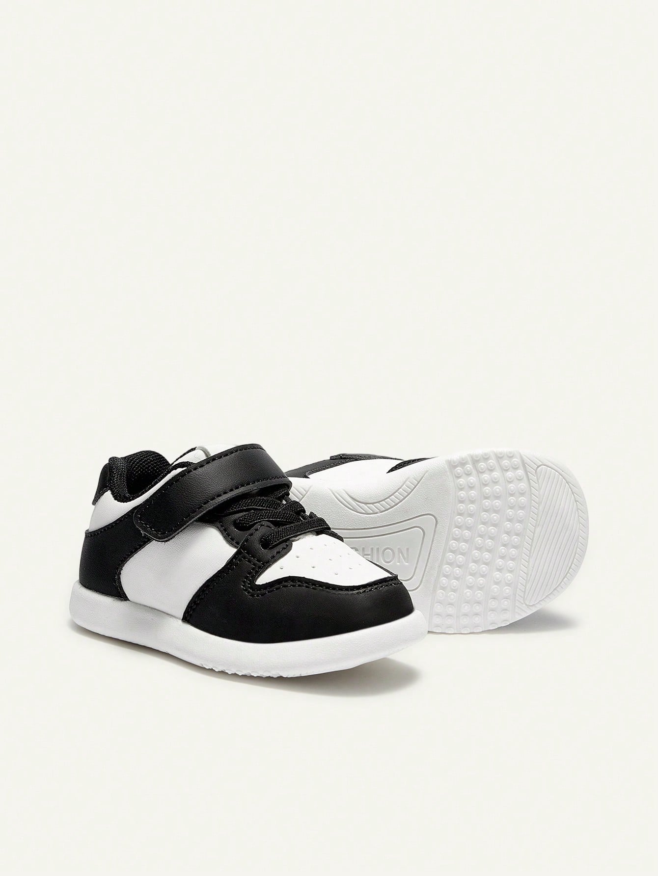Cozy Pixies Lightweight PU Leather Non-Slip Toddler Sneakers Black and White