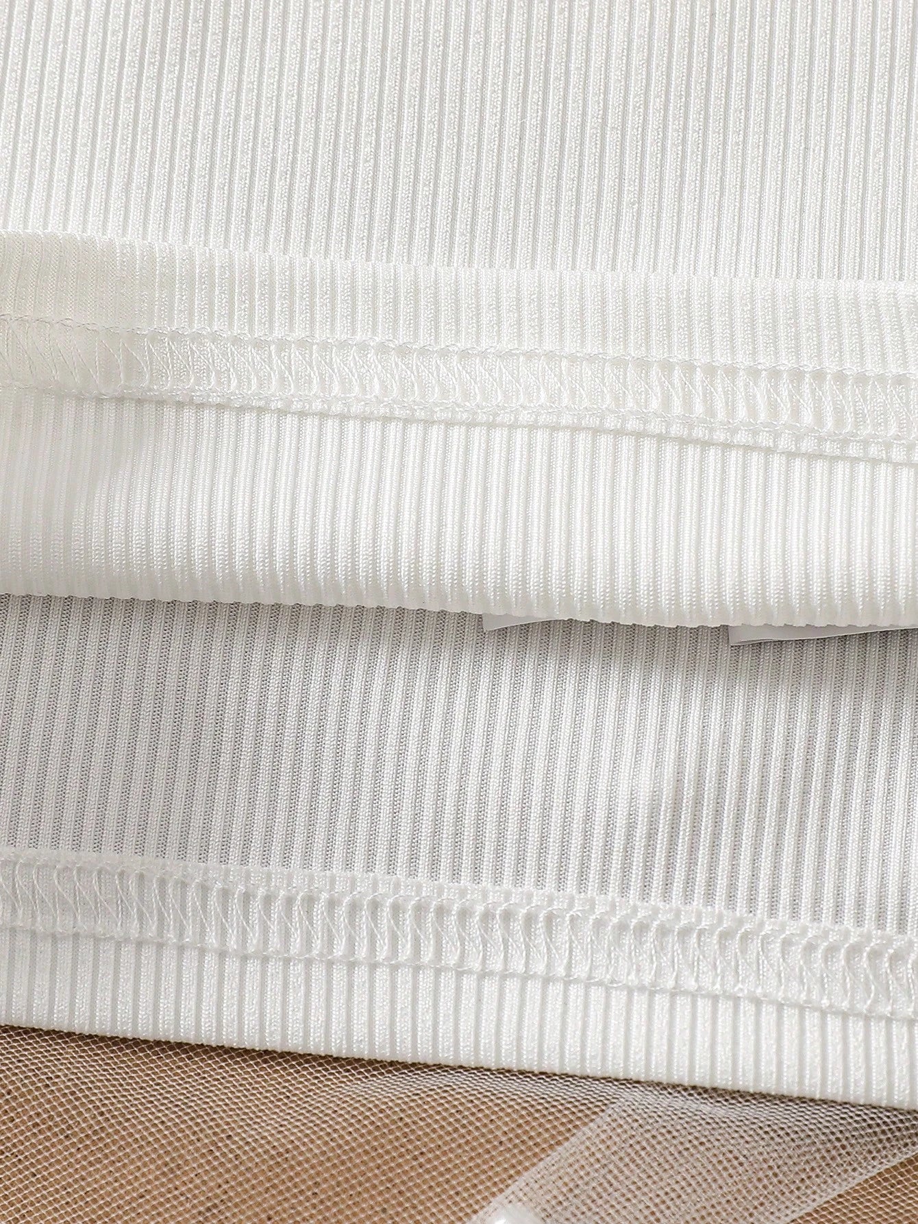 Ensemble deux pièces asymétrique fleuri rose et blanc pour bébé fille Souflis