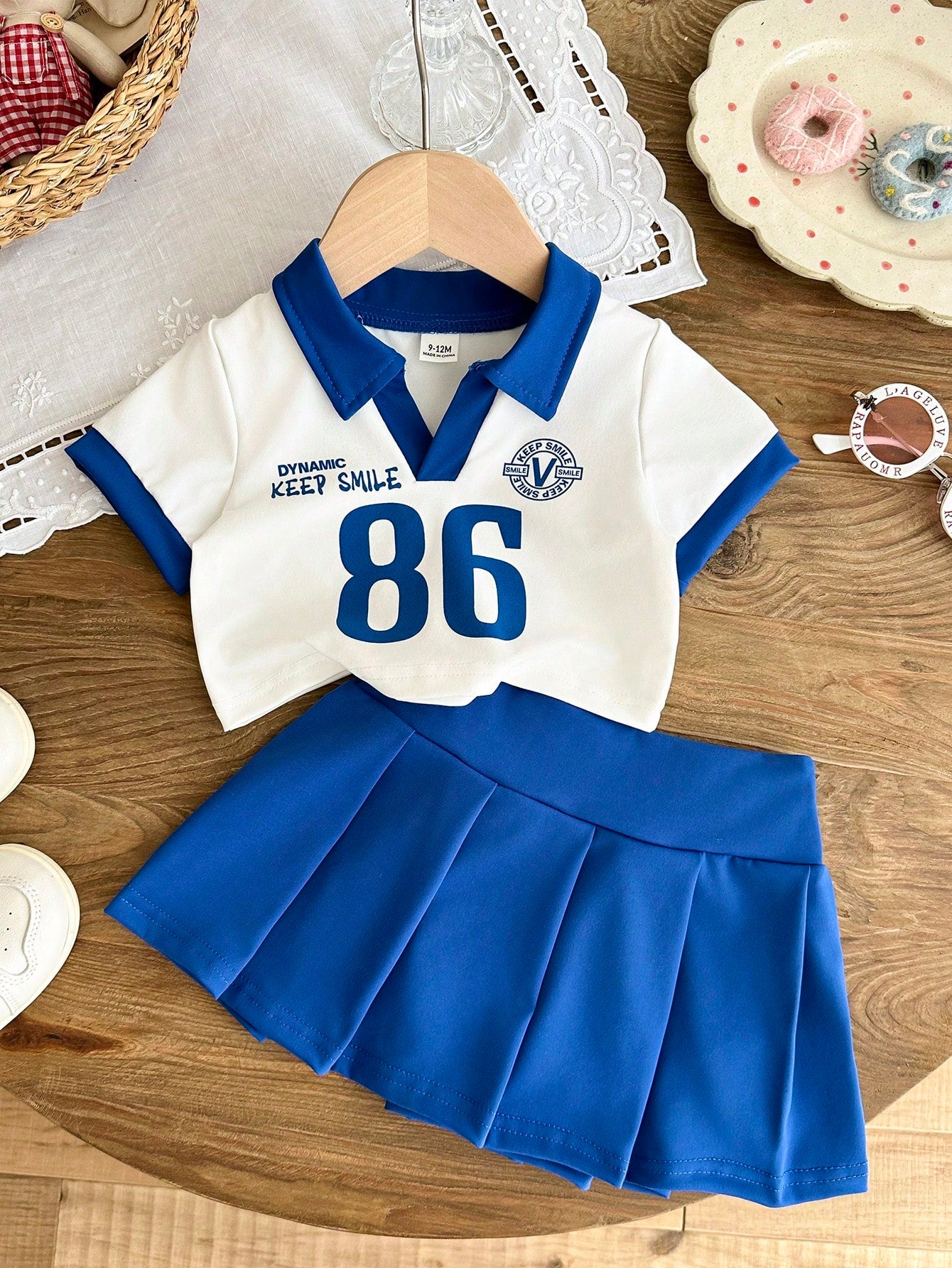 SHEIN Ensemble 2 pièces polo bleu et blanc et jupe plissée pour bébé fille Bleu
