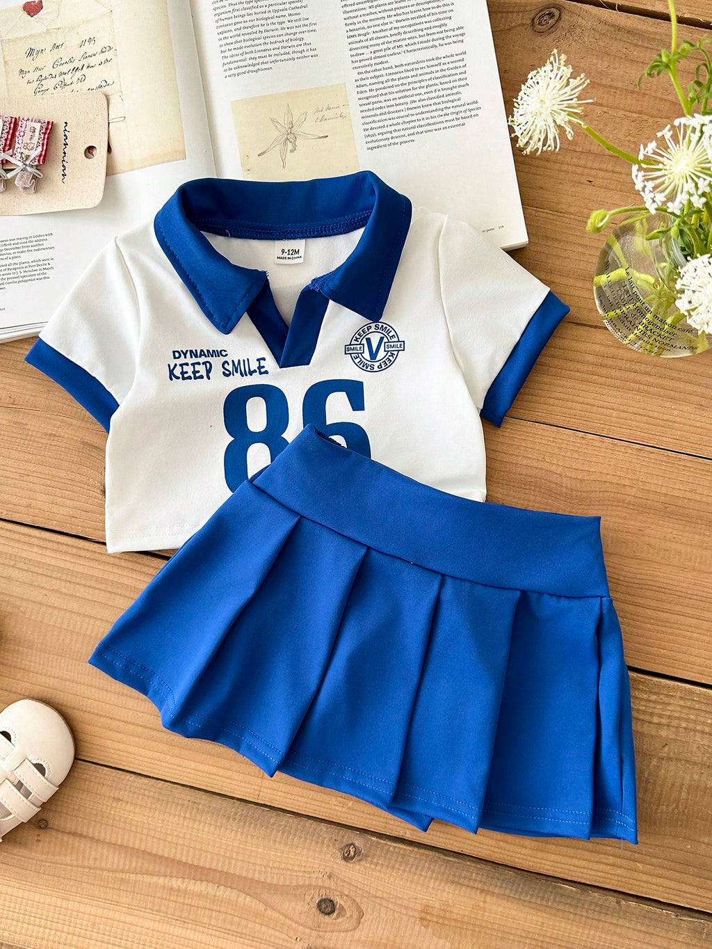 SHEIN Ensemble 2 pièces polo bleu et blanc et jupe plissée pour bébé fille Bleu