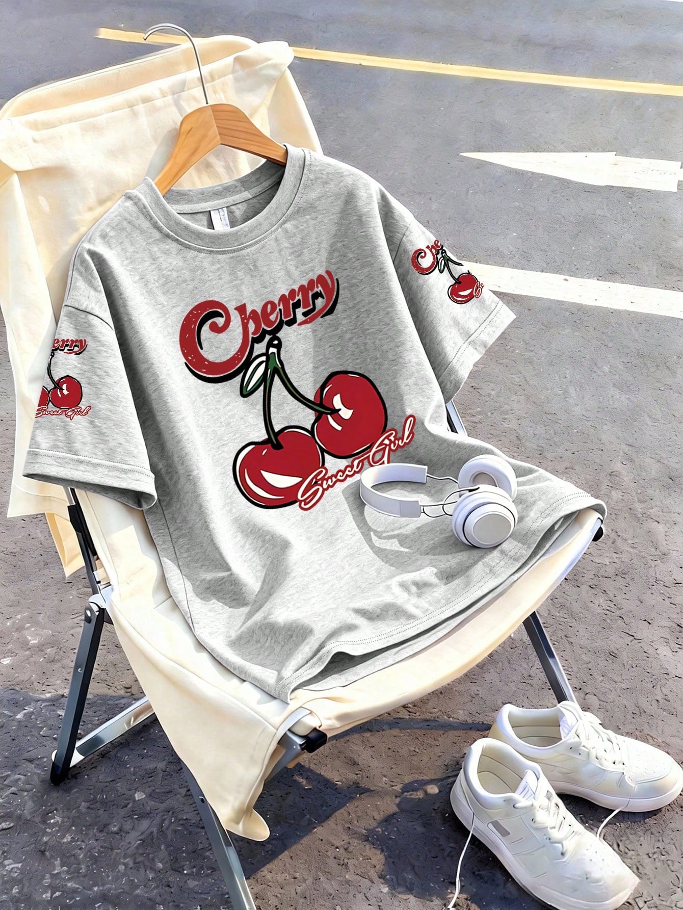 This Casual Girls' Set Includes A Round Neck T-Shirt With Cherry Print And Black Flare Pants. Whether For School, Shopping, Street Style, Or Vacation, It Is An Excellent Choice. Grey