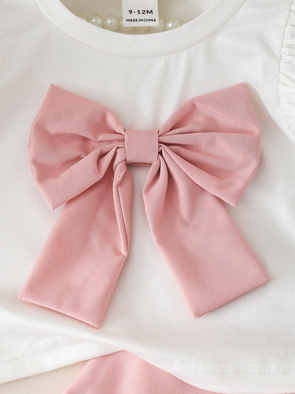 Ensemble 2 pièces Souflis pour bébé fille : haut rose et short fendu