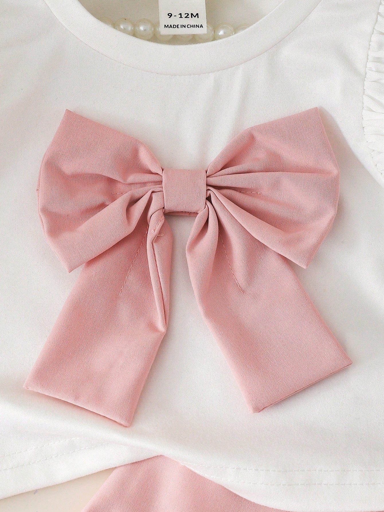 Ensemble 2 pièces Souflis pour bébé fille : haut rose et short fendu