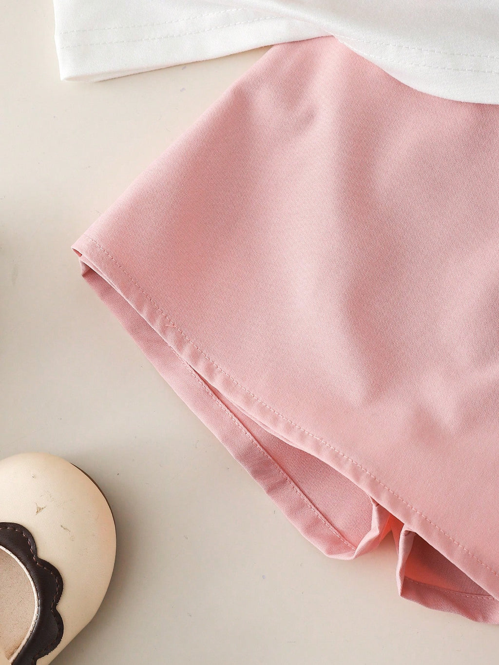 Ensemble 2 pièces Souflis pour bébé fille : haut rose et short fendu