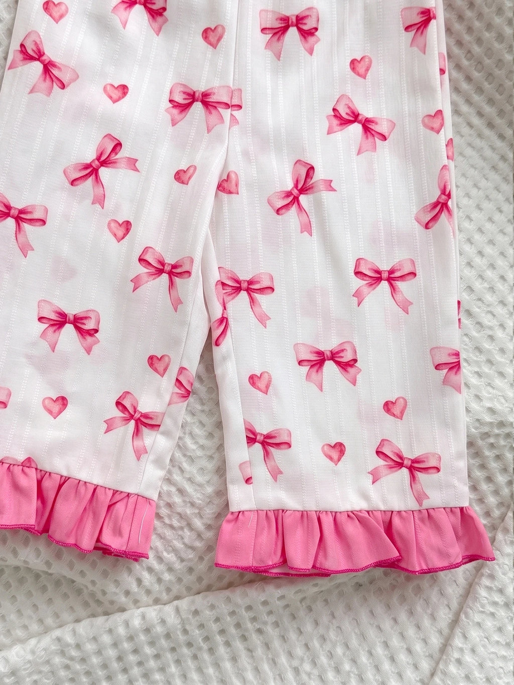 Ensemble pyjama à motif nœud et liserés contrastants avec volants pour bébé fille blanc