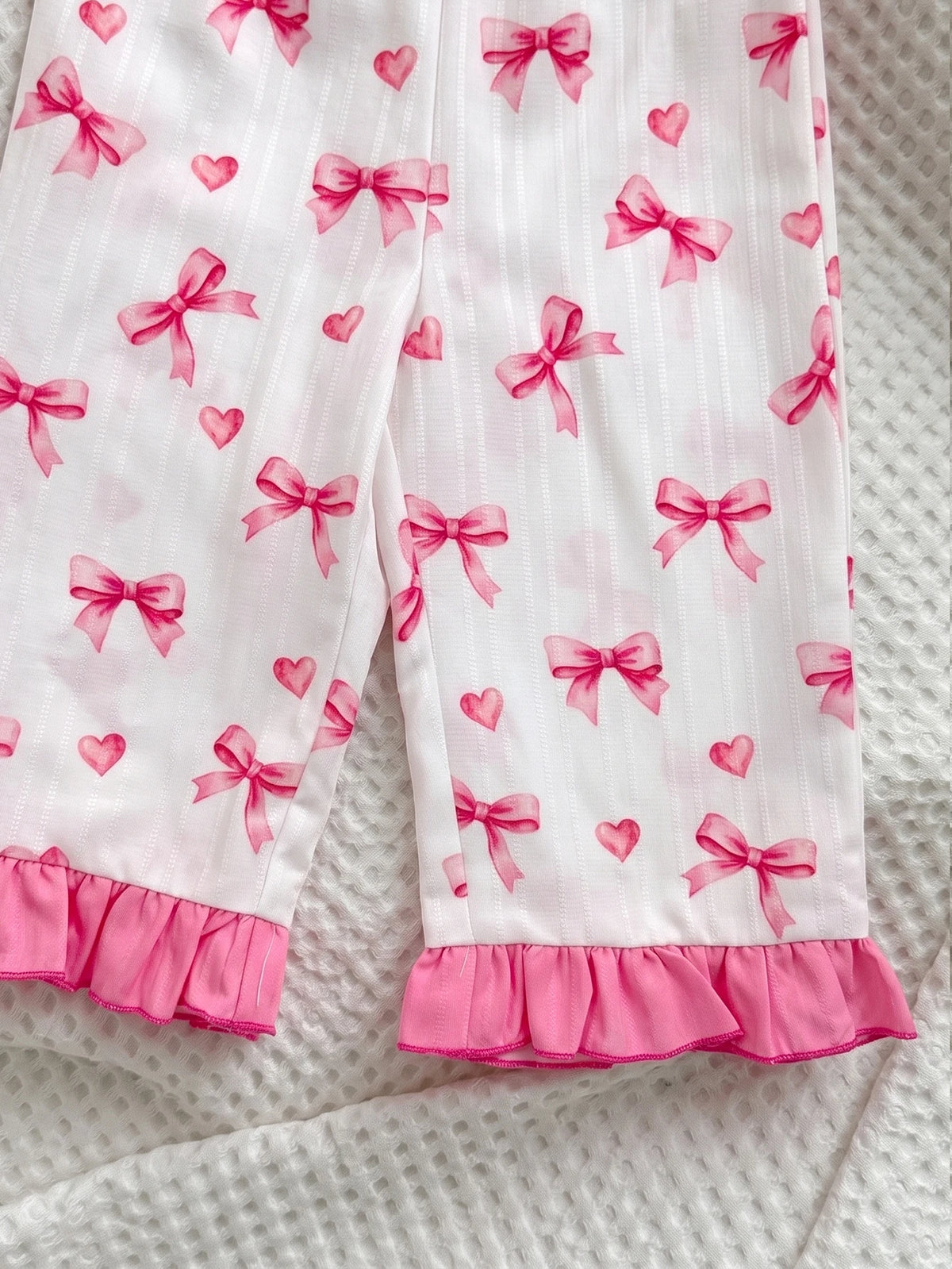 Ensemble pyjama à motif nœud et liserés contrastants avec volants pour bébé fille blanc